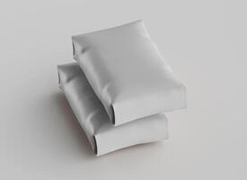 Two pillows are shown on a white background photo