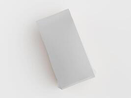 A white box with a blank sheet of paper on it photo