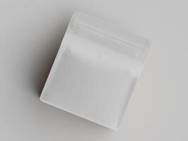 White plastic bag with a zipper on a gray background photo