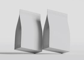 Two blank food pouches slightly angled white background photo