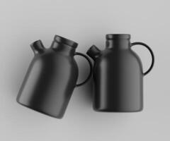 Two black jugs on a gray background photo