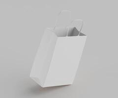 White paper bag with handles on a gray background photo