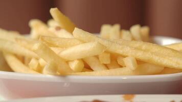 Enjoying crispy golden French fries at a local diner video
