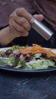 Fresh salad with mixed veggies and toppings video