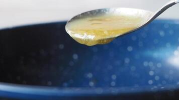 Cooking with butter in a blue skillet for delicious meals video