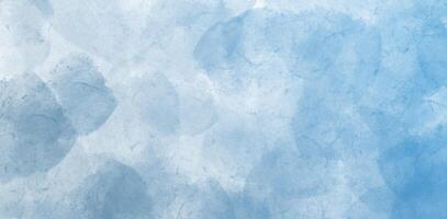 cool blue watercolor texture with soft layered pattern and cloudy abstract paint background photo