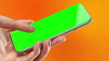 Animated of a person's hand playing with a smartphone with a green screen, ideal for editing or using chroma key in videos with an orange background