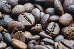 Close up of roasted coffee beans with customizable space for text. photo