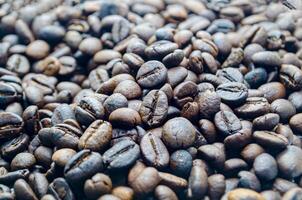 Roasted coffee beans that highlights the texture and surface details of the coffee beans with customizable space for text photo