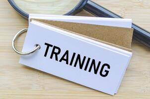 Training text on notepad suggesting staff development and onboarding initiatives photo