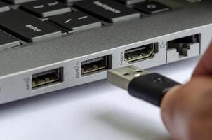 USB device connection close up showing vulnerability through physical interfaces photo