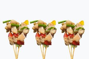 raw Yakitori, Charcoal , grilled chicken, Japanese style skewered chicken isolated on white background photo