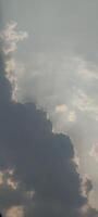 Sun Rays Through Dramatic Clouds Atmospheric Sky Background in High Resolution photo