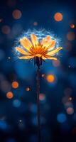 Glow of dandelion on blue. A vibrant dandelion illuminates the dark blue backdrop with glowing pollen, creating a magical nighttime atmosphere. photo