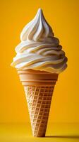 Creamy soft serve ice cream cone delight. A delicious soft serve ice cream cone with smooth, white cream against a vibrant yellow background. photo