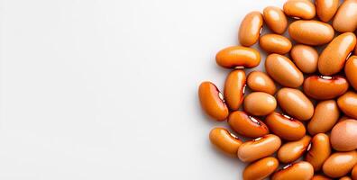 Artful display of dried beans. Various shades of dried beans are arranged in a circular formation on a plain background, showcasing their textures. photo