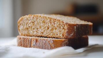 Freshly Baked Whole Grain Bread Slices on a Light Linen Cloth photo