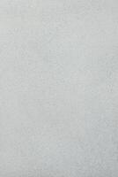 Smooth textured surface in light grey color ideal for various design applications photo