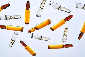 Various ampoules with drugs. View from below. photo
