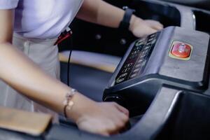 Activating Cardio Machine Person Interacting with Treadmill Con photo