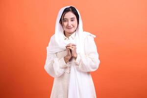 Serene Expression, A veiled woman offers a gentle smile with han photo
