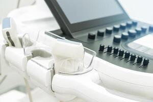 Modern Ultrasound Machine Ready for Use in a Clinical Setting During a Medical Examination photo