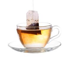 A cup of tea with a tea bag in it photo