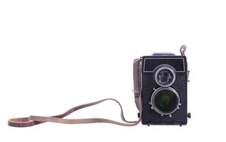 An old camera with a strap and a lens photo