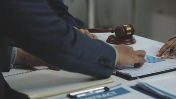 A judge and a lawyer are working on a case video