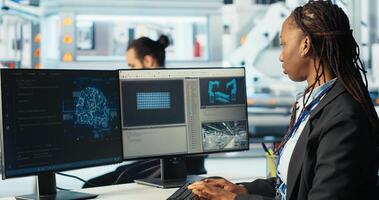 Photovoltaics programmer using AI technology to monitor system performance. Solar panels manufacturing plant developer using artificial intelligence to track energy production, camera B photo