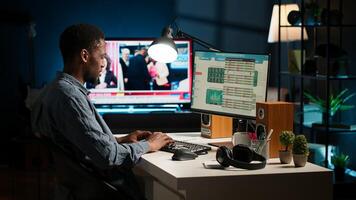 Operating from home setup, freelancer evaluating monetary data and searching international capital funds sources to help expand business. Fiscal analyst validates budget balance. Camera A. photo