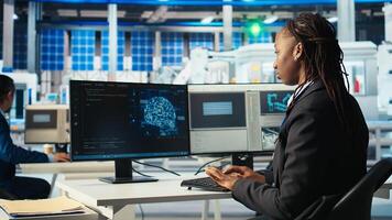 Photovoltaics programmer using AI technology to monitor system performance. Solar manufacturing plant developer using artificial intelligence to track energy production, camera A photo