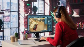 Designer interacts with digital technology to produce virtual home. Architectural software enables 3D modeling and rendering, placement of furniture and layout adjustments. Camera B. photo