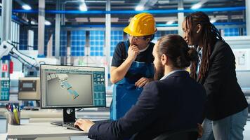 Factory team leader gives workers tasks after analyzing system health metrics. Solar panels plant manager tells employees fixes to make after troubleshooting technical issues, camera A photo