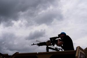 People attend a festival marking the 250th anniversary of the U.S. Army on the National Mall in Washington, D.C., before the military parade on June 14, 2025. editorial_image