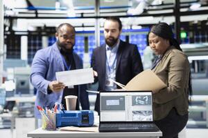 Diverse team of professional engineers and analysts discuss improvements in solar tech manufacturing process, advancing renewable energy through shared insight and industrial innovation. photo