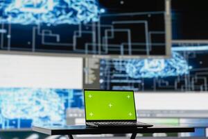 PC showcasing chroma key display next to AI neural networks system, machine learning used for practicing predictive analytics and cloud computing. Implementing artificial intelligence brain. photo