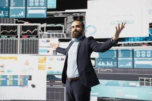 Confident powerful administrator feeling proud of his career success for a high end life and legacy, ensuring good performance metrics for growth. Achieving greatness with self belief. photo