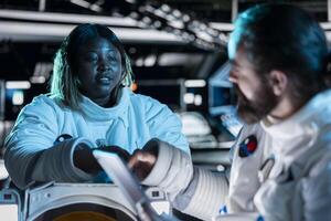 Cosmonauts preparing for planetary mission outside, gathering samples for study. Orbital station talking, beginning landing procedures on solar system planet, deepening understanding of universe photo