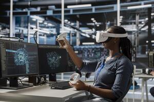 Programmer in data center wearing VR headset using AI powered tech to run simulations. IT expert using virtual reality, coding algorithms to extract insights from data and automate rigs photo