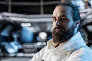 Portrait of cosmonaut in spacecraft powered by advanced engineering prepares for planetary mission outside. Man in orbital station navigating orbital trajectory, beginning landing procedures on planet photo