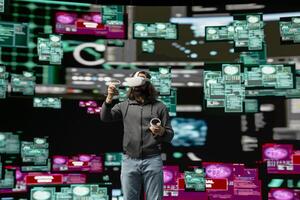 Hacker bypasses network security and engages in cyber crime with vr headset, programming code for data breach and system override. Covert cyber operations through infiltration. photo