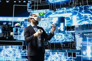 High tech expert uses vr glasses next to neural network AI brain system, using predictive analytics and cybernetics for machine learning concept. Cloud computing automation tools for innovation. photo