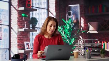 Female applicant at a virtual job interview chatting via online call, applying for a job vacancy listed on a web recruiting platform. Ambitious woman looking to get hired, job offer. Camera A. photo