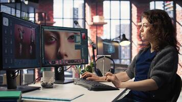 Photographer editing photos on modern pc setup in agency office, using color grading and retouching technique. Ideal workspace for digital designer, art photography. Camera A.