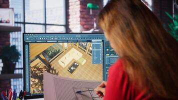 Graphic artist uses architectural software and blueprints to create 3D render of home interior. Program allows to configure furniture and other design elements for virtual layout. Camera B. photo