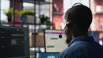 Customer center expert uses AI assistant to generate technical solutions for clients. Call center agent uses artificial intelligence LLM chatbot to provide guidance to customers, camera A photo