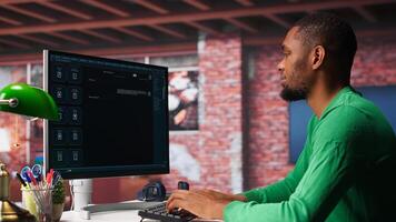African american guy using artificial intelligence chatbot trained to understand and generate information, data prompt for virtual generative technology. User talks with AI powered chat. Camera A. photo
