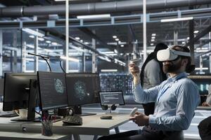 Data center engineer monitoring AI systems performance using VR headset, identifying bottlenecks. Artificial intelligence server farm worker troubleshooting glitches using virtual reality photo