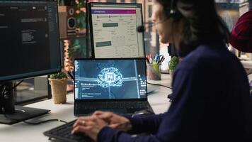 Call center agents track shipments using AI chatbot for help. Customer center workers use artificial intelligence assistance to locate clients packages and provide status updates, camera A photo